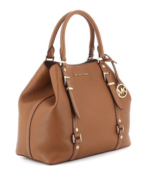 michael kors handbags are overpriced|Michael Kors latest handbag collection.